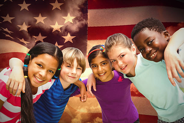 istock Composite image of happy children forming huddle at park 505984008