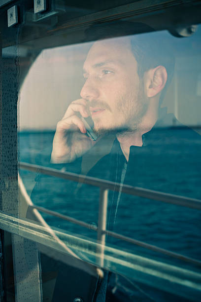 istock young man on mobile phone 505989484