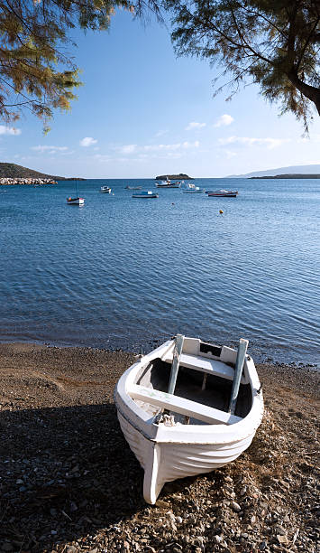 istock Boat on shore and sea 505992260