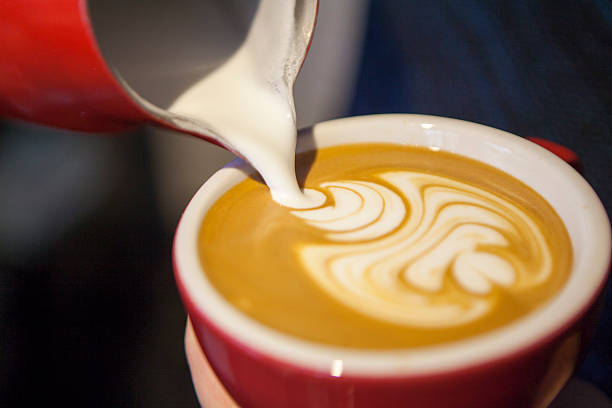 istock Barista Pouring Latte Froth Art 505992894