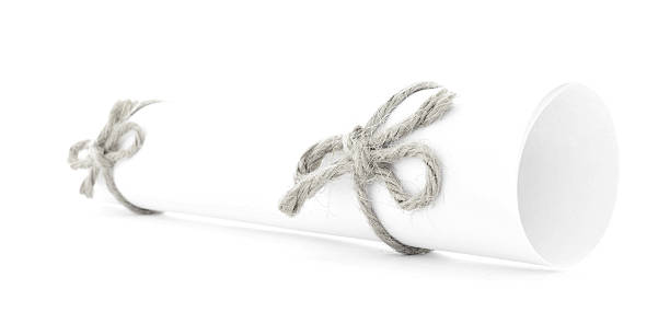 istock White paper scroll tied with cord, two natural bows isolated 505993056