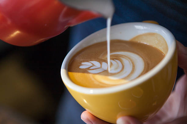 istock Barista Pouring Latte Froth Art 505993440