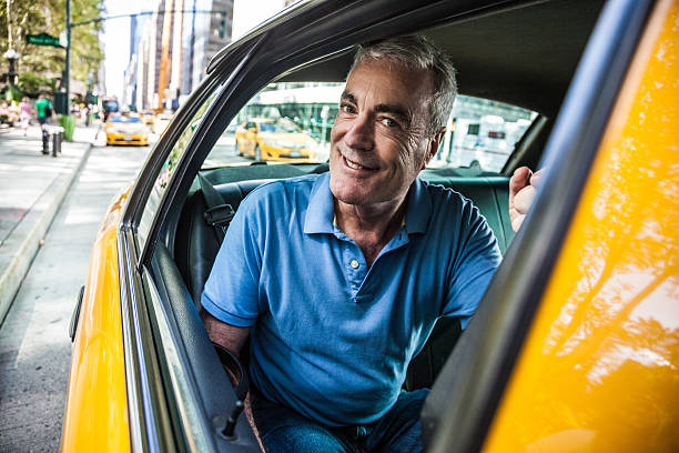 istock Man inside a taxi in New York downtown 505994536