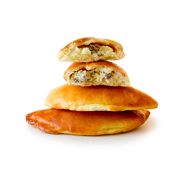 Fresh baked russian pastry pirozhki .