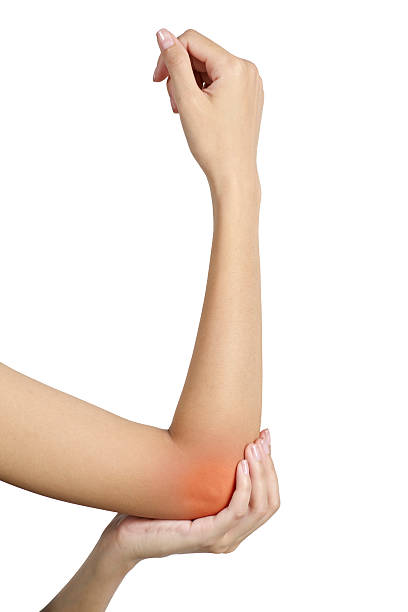 istock Woman holding her elbow in pain 505996224
