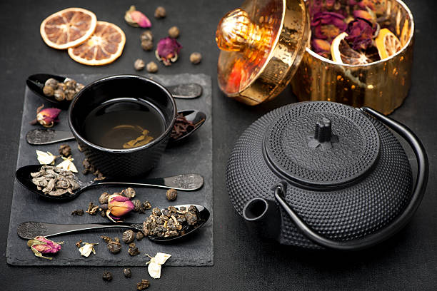 istock Green tea with jasmine and roses. Asian black tea set 505996562