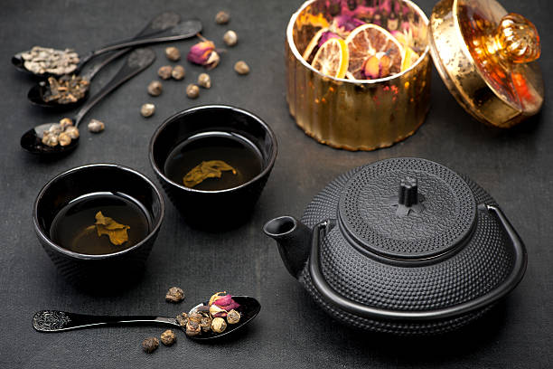istock Green tea with jasmine and roses. Asian black tea set 505996632