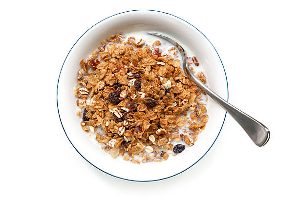 istock Bowl of Cereal Isolated on White Overhead View 506006936