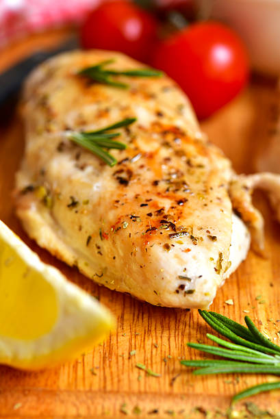 istock Chicken breast baked with rosemary. 506008368