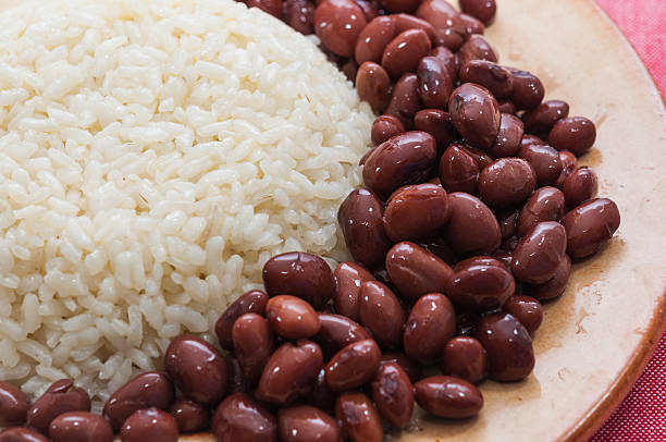 Rice dish with red beans Bowl of white rice with red beans bean stock pictures, royalty-free photos & images