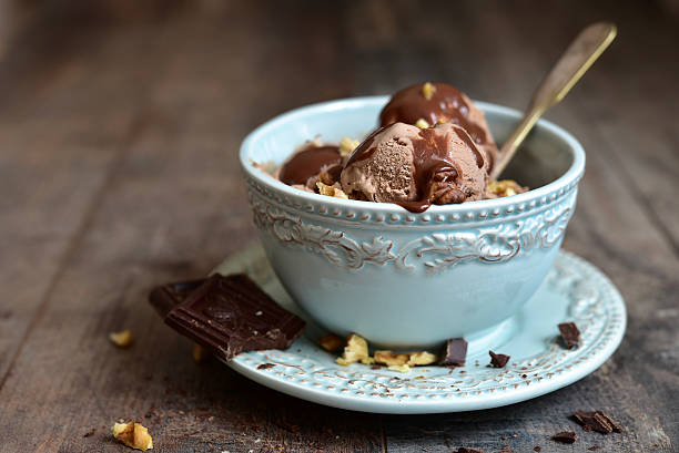 istock Chocolate ice cream with walnut in a vintage bowl. 506010176