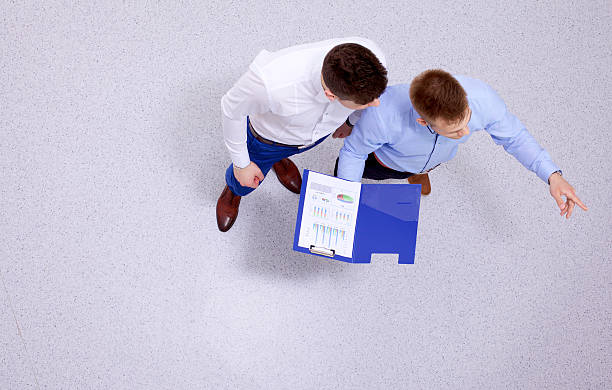 istock Business people shaking hands - topview 506011036
