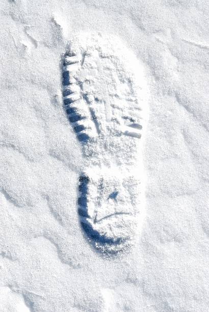 Boot print marks the new snowfall with evidence of people