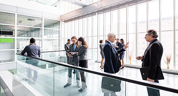 istock Large group of Business people in lobby 506012686