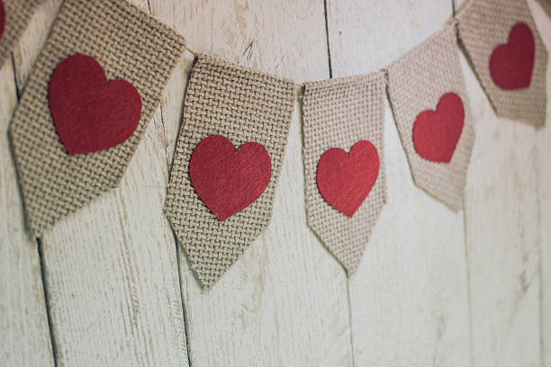 istock Valentine’s hearts on rustic wooden texture background 506013222