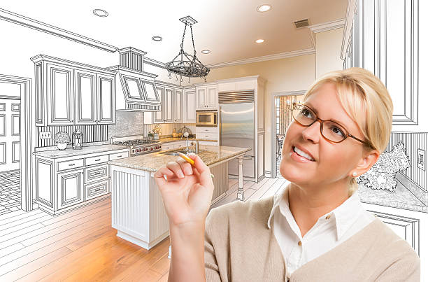 istock Woman With Pencil Over Custom Kitchen Drawing and Photo Combination 506014088