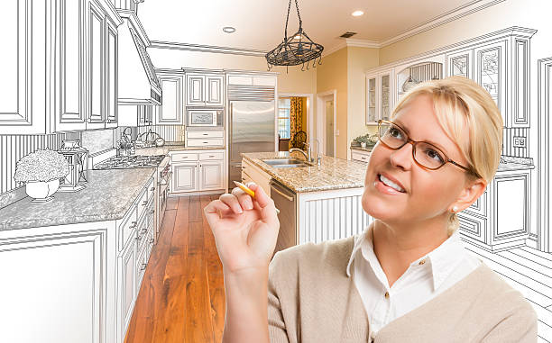 istock Woman With Pencil Over Custom Kitchen Drawing and Photo Combination 506014120