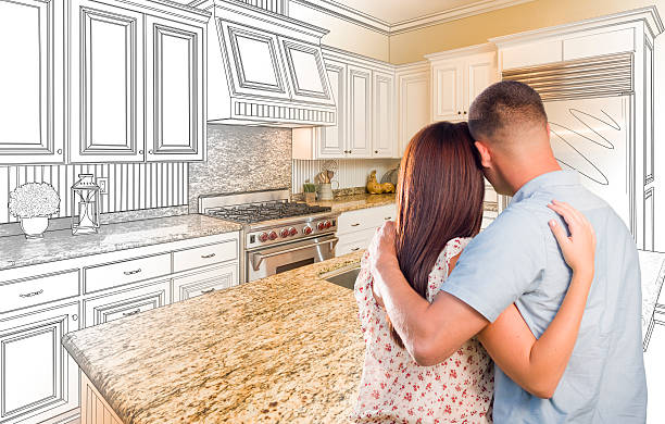 istock Young Military Couple Inside Custom Kitchen and Design Drawing 506014332
