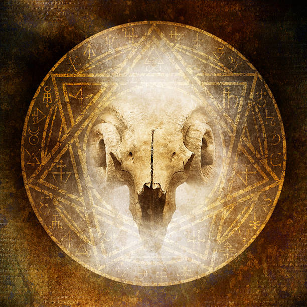 Black Mass Black Mass design with a sinister demonic ram skull materialising within an occult symbol against a dark weathered Latin text background. satan goat stock pictures, royalty-free photos & images