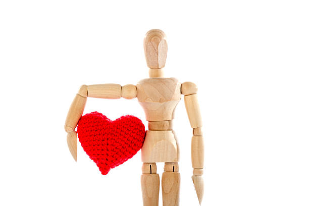istock Love confession with wooden dummy 506016600