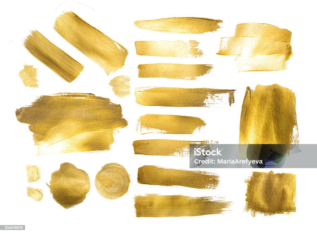 Collection of golden paint strokes to make  background out of Collection of golden paint strokes to make a background for your design Gold Colored Stock Photo