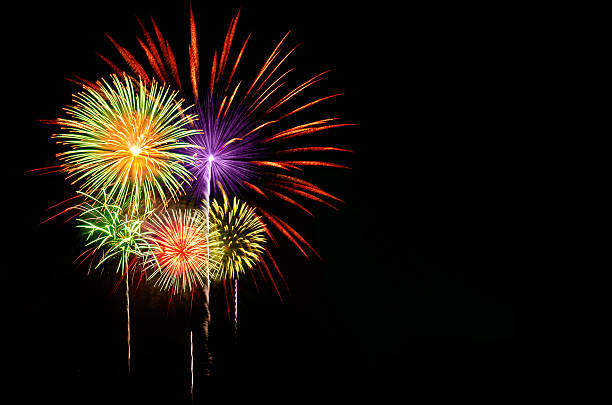 istock Colorful fireworks celebration on dark background. 506029806
