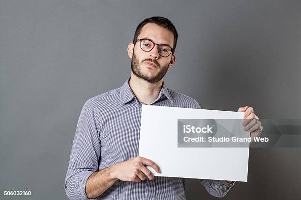 Unhappy Young Man Claiming For A Strike On Blank Banner Stock Photo - Download Image Now
