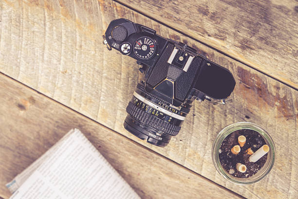 istock Vintage camera ashtray newspaper 506032954