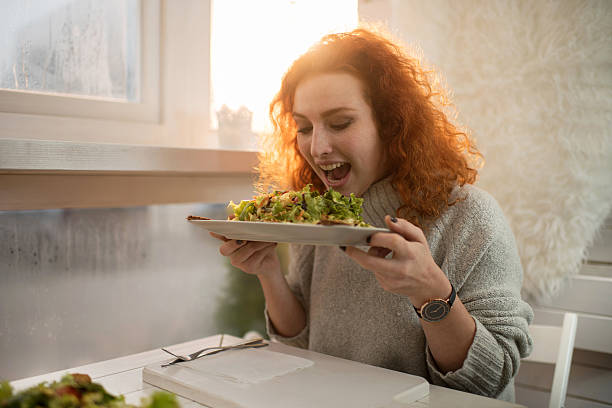 istock I'm going to eat the whole salad at once! 506036382