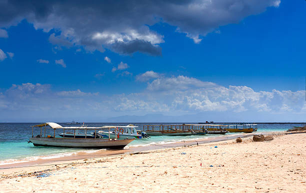 istock dream beach with boat Bali Indonesia 506037384