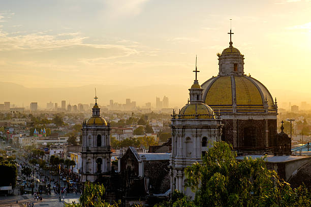 Scenic view at Basilica of Guadalupe with Mexico city skyline stock photo