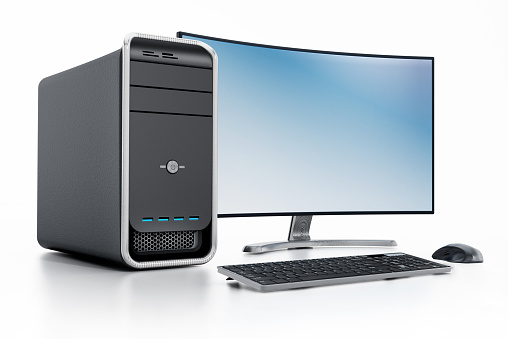 Modern desktop PC (personal computer) with curved ultra HD LED screen isolated on white. Clipping path is included in the highest file resolution.