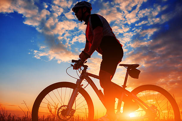 istock biker in autumn on a sunny afternoon 506041092