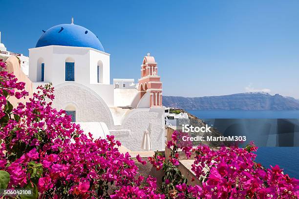 Scenic View Of Traditional Cycladic Houses With Flowers In Foreg Stock Photo - Download Image Now