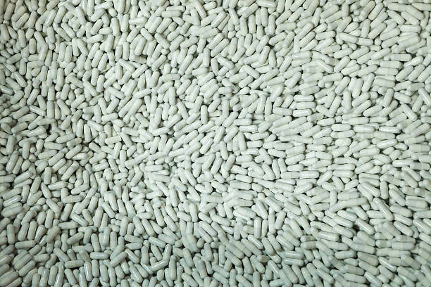 istock White of pills. 506056822