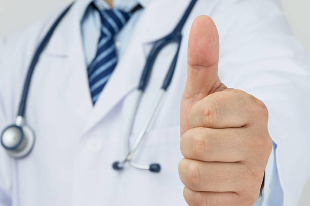 istock doctor thumbs up 506056978