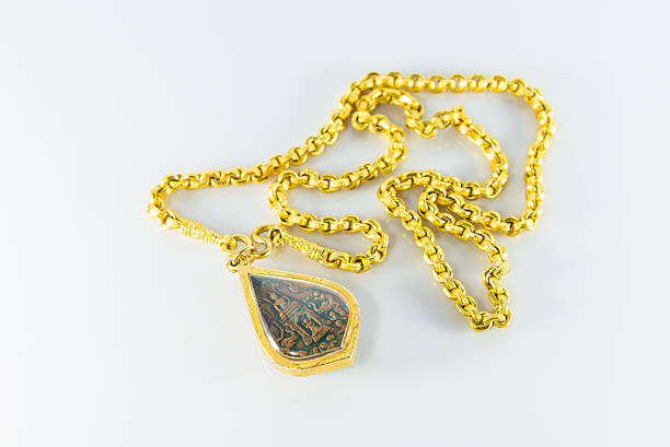 istock Gold necklaces and amulets 506058516