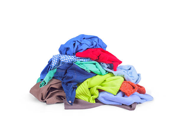 istock heap of colorful clothes, 506059260