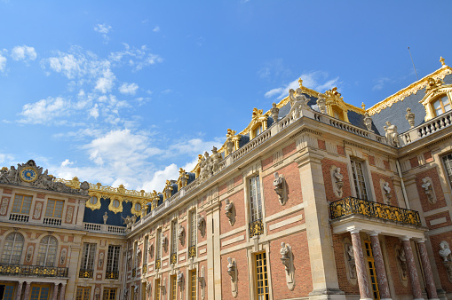 Versailles, France - July 27, 2014: Facades of the Palace of Versailles in France. It was an official residence of the kings of France and is now a World Heritage Site. 