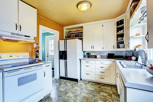 istock White kitchen interior with peach walls and khaki linoleum 506061709