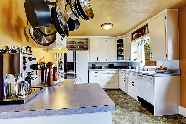 istock Kitchen interior with peach walls and khaki linoleum 506061991