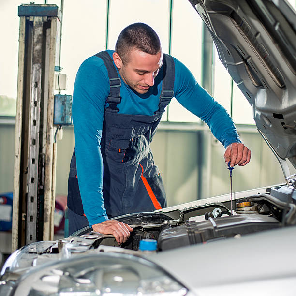 istock Check the engine oil in car 506063525