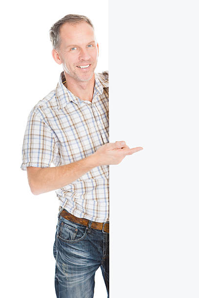 istock Mature Man Holding Placard 506063675