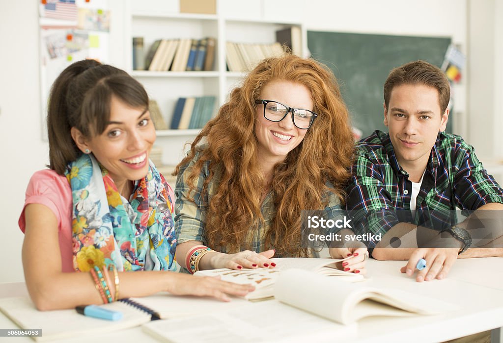 College students in a classroom. Group of college students in a classroom. Classroom Stock Photo