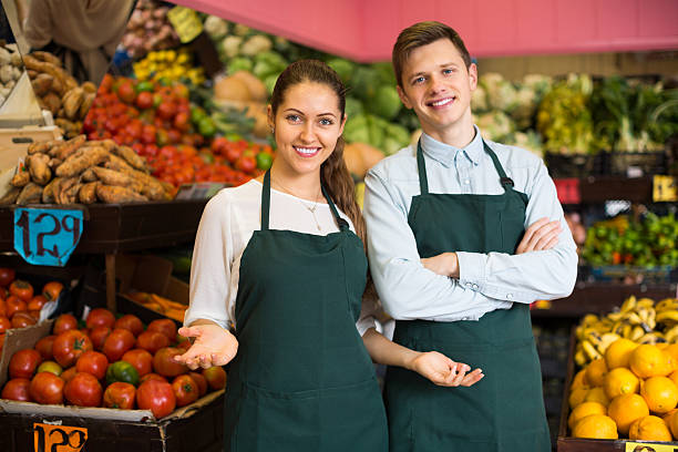 istock workers selling fresh fruits 506065056