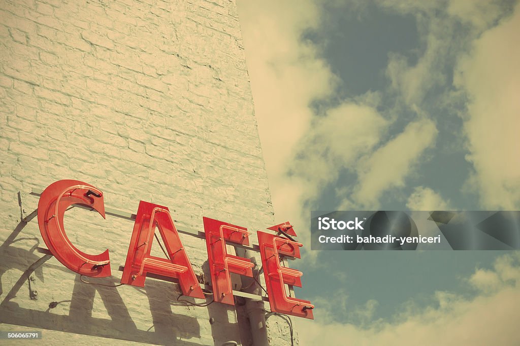 Cafe Sign Red Cafe Sign Against Blue Sky with a Retro Effect Sign Stock Photo