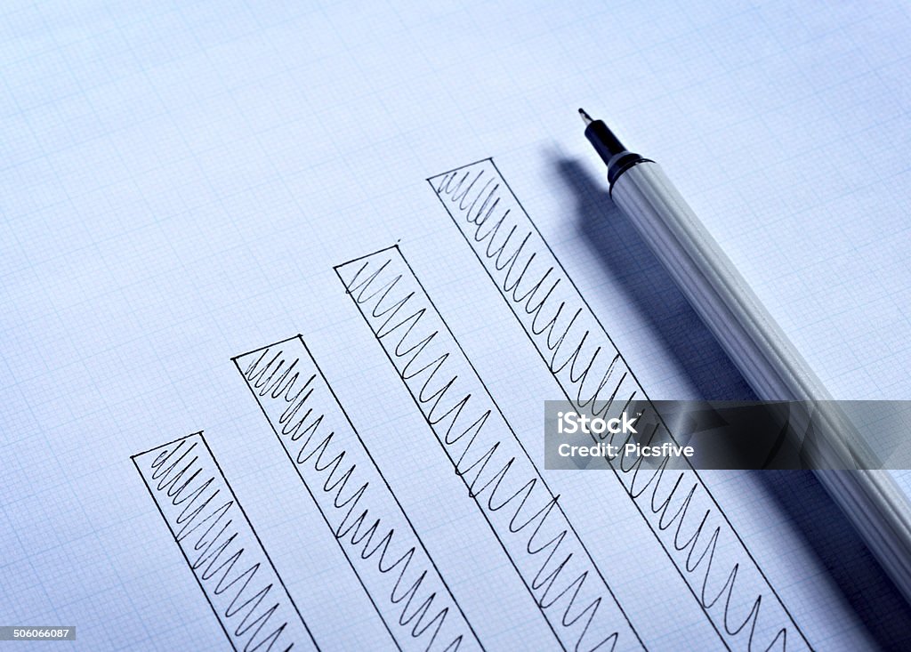 diagram graph for finance business close up of a finance graph on an office deskclose up of a finance graph on an office desk Arrow Symbol Stock Photo