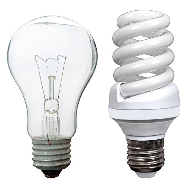 istock Incandescent and fluorescent energy saving light bulbs 506066994