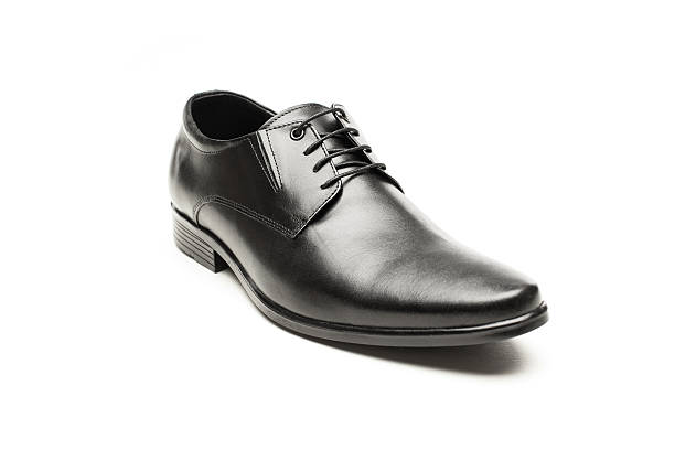 istock Men's shoes in black on a white background 506067138