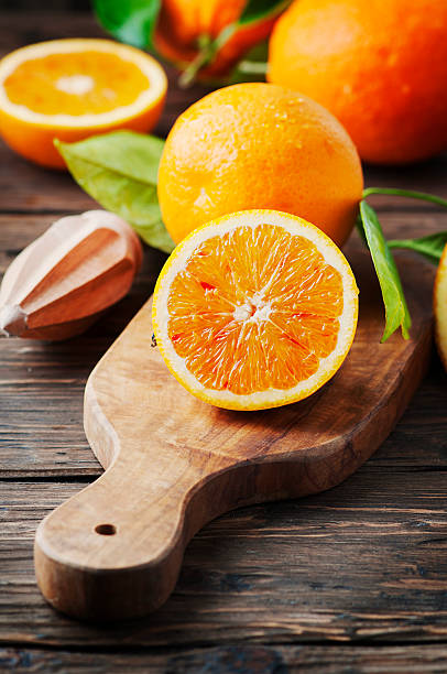 istock Fresh sweet oranges on the wooden table 506067804